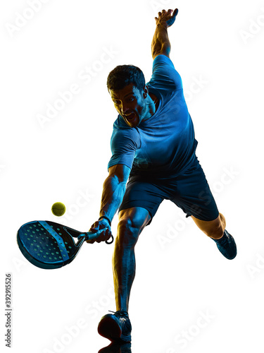 one caucasian mature man Paddle Padel tennis player shadow silhouette in studio isolated on white background