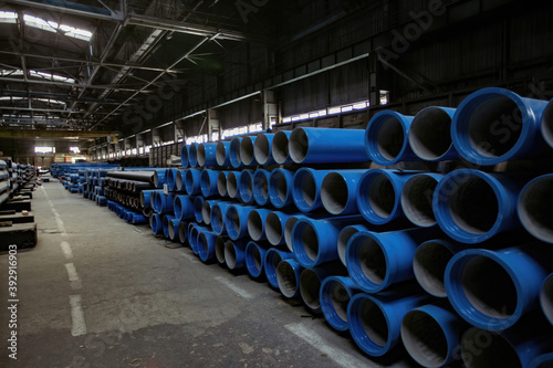 New cast iron pipes for pipeline construction in warehouse