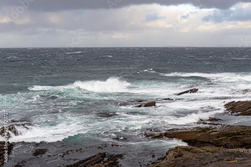 waves crashing on rocks