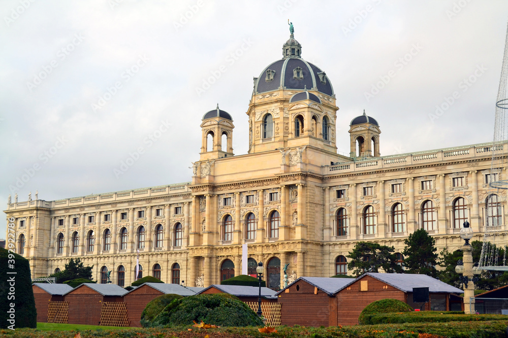 Beautiful museum building in the central square in Vienna. Christmas Fair in the foreground. Austria