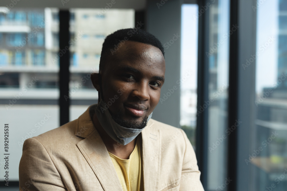 Portrait of african american man smiling at modern office Portrait of african american man smiling at modern office