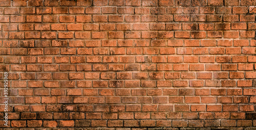 background and texture of old decorative red brick wall fence