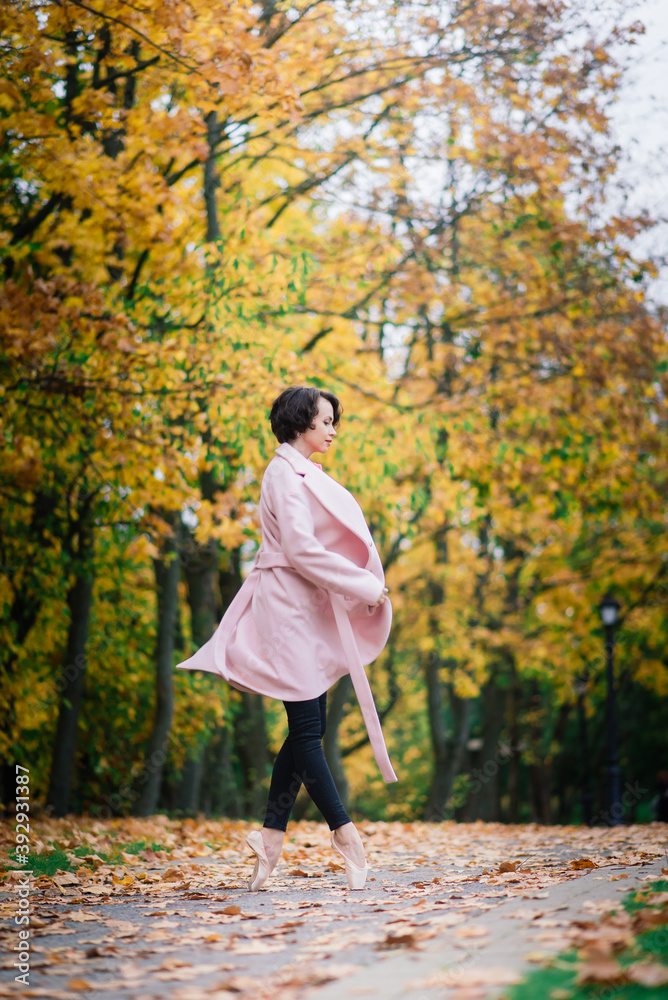 Ballerina dancing in nature among autumn leaves. Ballerina dancing in nature among autumn leaves.