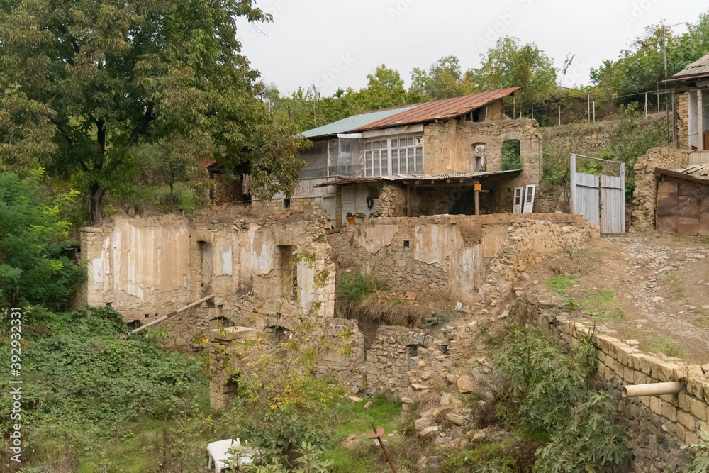 Semi destroyed houses in the town of Hadrut part of the Janapar Trail in Nagorno Karabakh in the Republic of Artsakh
