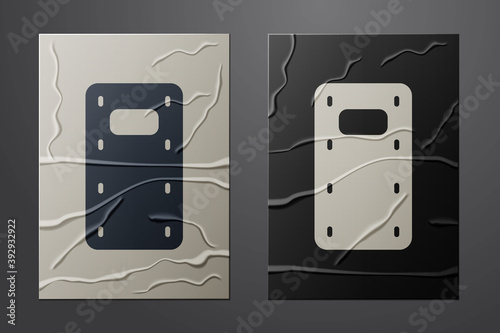 White Military assault shield icon isolated on crumpled paper background. Paper art style. Vector.