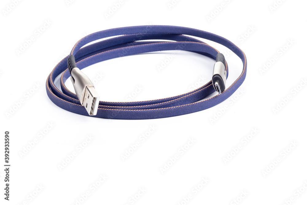 studio lighting. on a white background cable, wire for charging or connecting the phone, USB flash drive. studio lighting. on a white background cable, wire for charging or connecting the phone, USB flash drive.