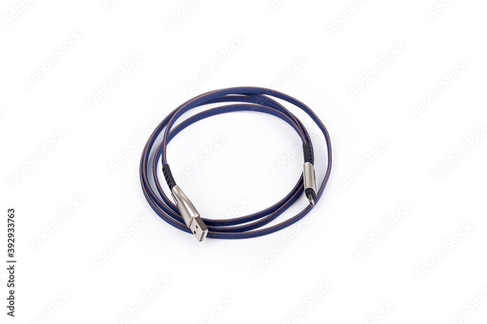 studio lighting. on a white background cable, wire for charging or connecting the phone, USB flash drive. studio lighting. on a white background cable, wire for charging or connecting the phone, USB flash drive.