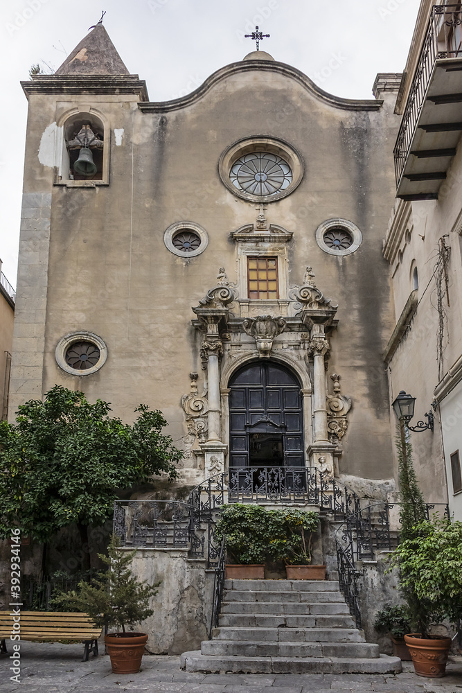 Fototapeta premium Carved Baroque portal of Santo Stefano Church also known as church of Purgatory (Chiesa del Purgatorio, 1668) at Piazza Giovanni in Cefalu, Sicily, Italy.