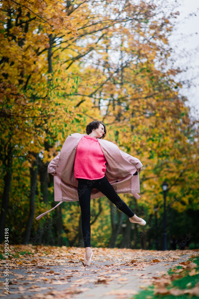Ballerina dancing in nature among autumn leaves. Ballerina dancing in nature among autumn leaves.