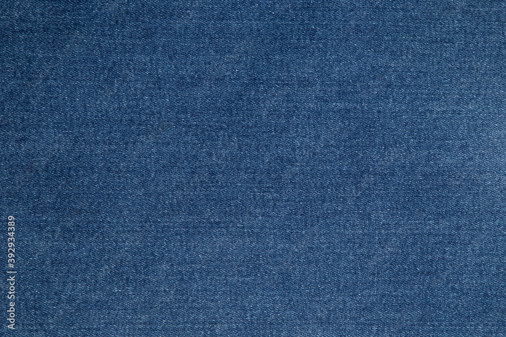 Blue background, denim jeans background. Jeans texture, fabric. Texture Jeans. Close Up Of Blue Jeans Fabric Macro With External Seams Yellow Blue background, denim jeans background. Jeans texture, fabric. Texture Jeans. Close Up Of Blue Jeans Fabric Macro With External Seams Yellow