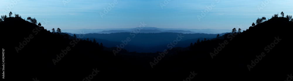 Blue mountains at sunrise panoramic abstract background, Geres National Park, Portugal.