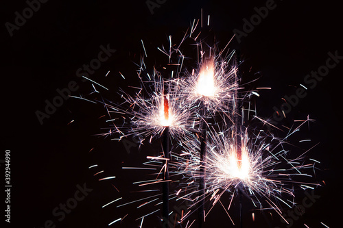 Burning sparkler firework. Happy new year and Merry christmas concept.  Party  Holiday decoration  Happy holidays.