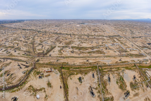 Картината върху платно Oil fields in Kern California seem to stretch on forever