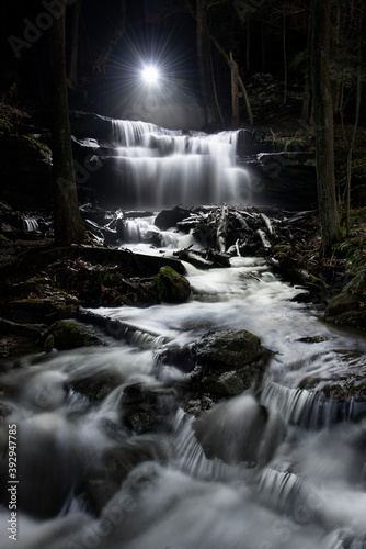 Gunn Brook Falls illuminated at night photo