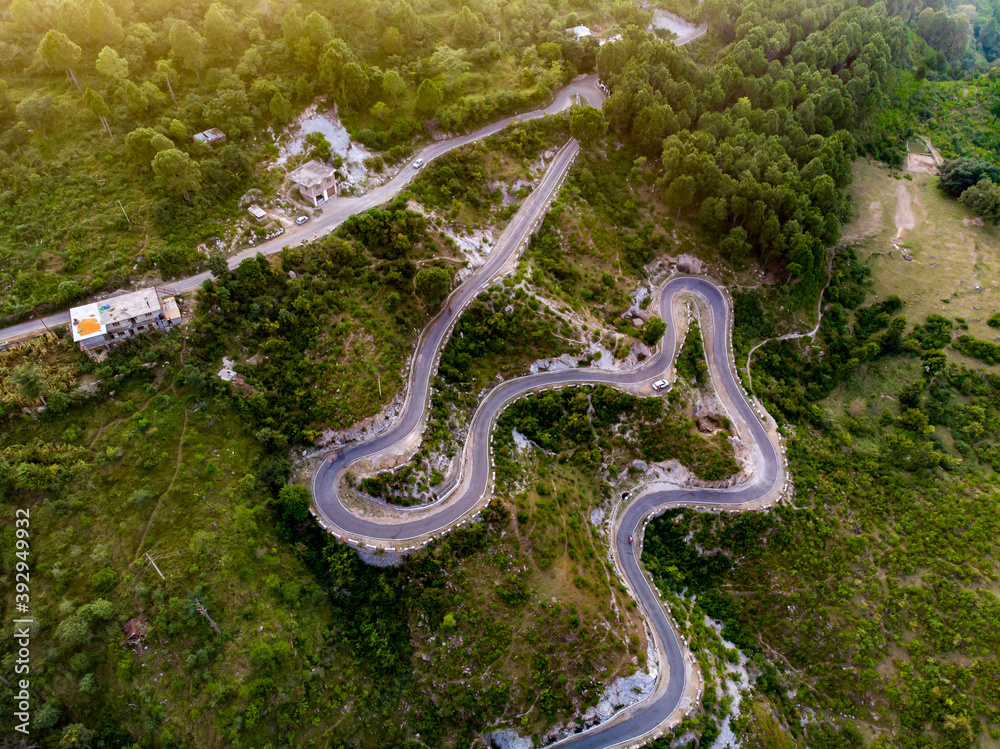 Snake Curves. Aerial view of a road through the mountains. Snake Curves. Aerial view of a road through the mountains.