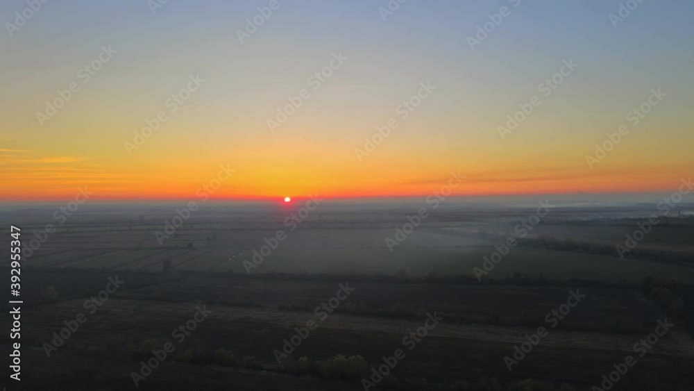 Beautiful dramatic sunset in the valley during sunset nature fog move over landscape Beautiful dramatic sunset in the valley during sunset nature fog move over landscape