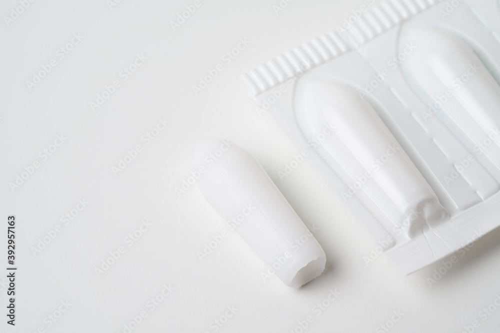 Suppositories for anal or vaginal use on a white background medication. Suppositories for anal or vaginal use on a white background medication.