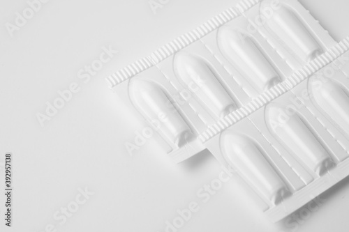 Suppositories for anal or vaginal use on a white background medication.