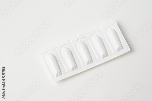 Suppositories for anal or vaginal use on a white background.