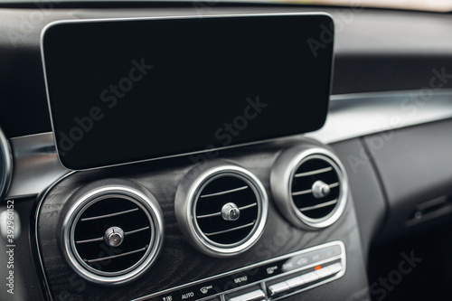 Luxury car air conditioning system intakes at the panel © Moose