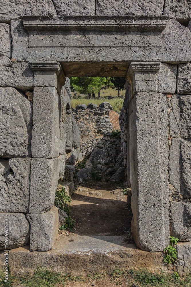 Ruins of Diana Temple (Tempio di Diana) - megalithic structure found about 150 meters above sea level, on imposing La Rocca hill dominating town of Cefalu. Province of Palermo, Cefalu, Sicily, Italy. Ruins of Diana Temple (Tempio di Diana) - megalithic structure found about 150 meters above sea level, on imposing La Rocca hill dominating town of Cefalu. Province of Palermo, Cefalu, Sicily, Italy.