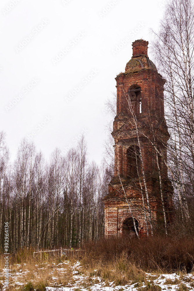 Abandoned three-tiered Orthodox bell tower, Church of the Holy Trinity in Troitsa-Zazharye, Russia, Kostroma region