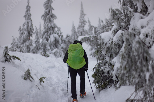 hiking in the snow mountain © Apic Productions