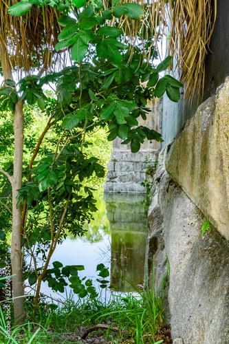 View from the loophole of the old fort to the old brick wall and moat, filled with water around the walls of the fort, Key West, Florida, US photo