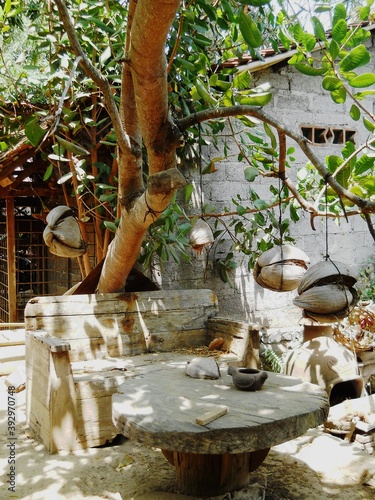 wooden garden table and chair at the back of the house