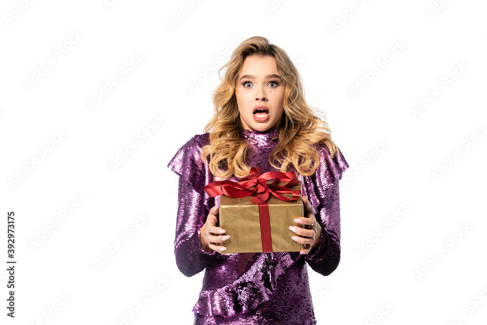 shocked elegant woman in sequin dress with gift box isolated on white shocked elegant woman in sequin dress with gift box isolated on white