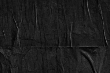 Black grey paper background creased crumpled surface / Old torn ripped posters scary grunge textures  