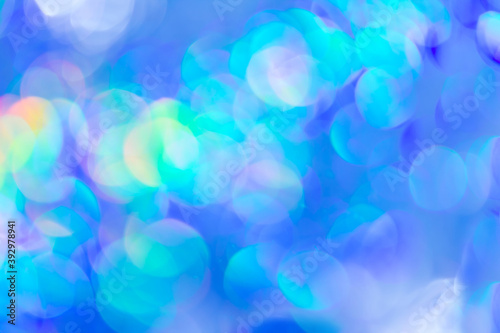 Colorful blue blurred background, flickering holiday