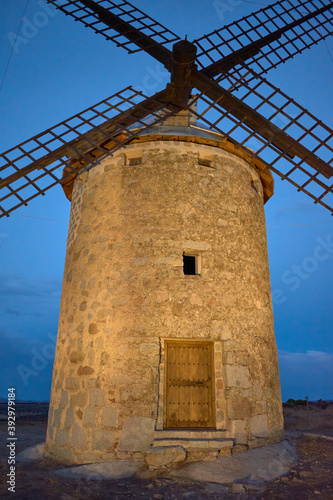 Close-up Windmil at sunset in Las Ventas with Peña Aguilera, Toledo, Castilla La Mancha, Spain photo