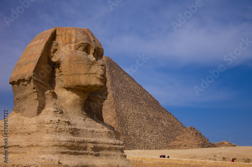 Beautiful profile picture of Sphinx with pyramid Giza behind