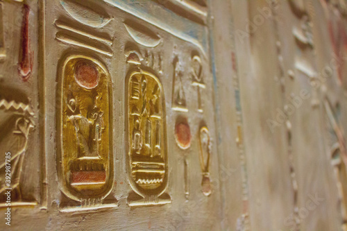 Hieroglyphs in detail of Pharaohs on the temple walls of Egypt