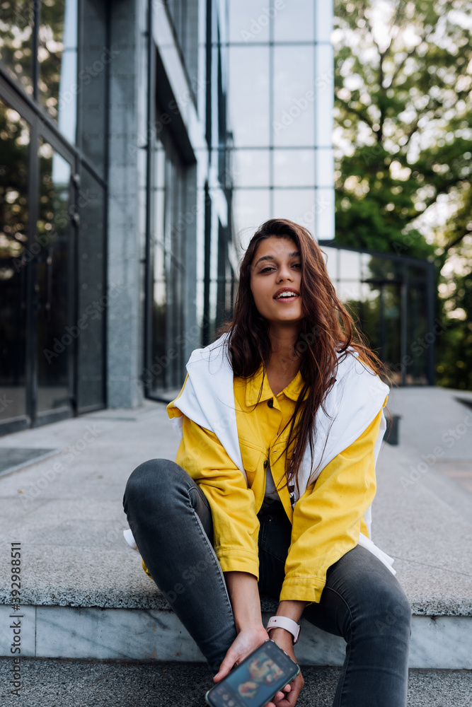 Portrait of cute beautiful young woman having fun and posing outdoors. Portrait of cute beautiful young woman having fun and posing outdoors.