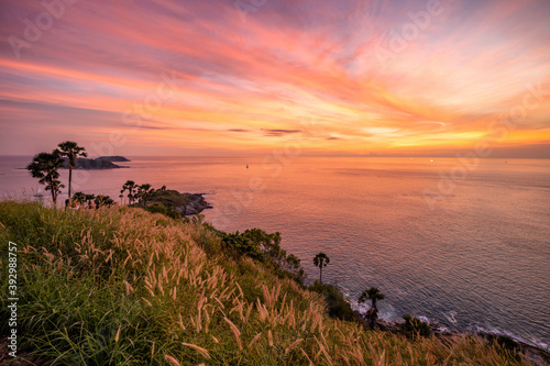Landscape of Promthep cape in evening with beautiful dramatic twilight sky (Phuket, Thailand) photo