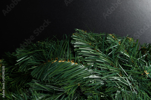 Christmas new year composition on black background. Fir branches  christmas decoration. Flat lay  top view  copy space