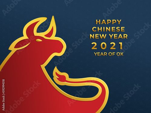 Happy chinese new year 2021 year of ox. Red ox in the dark blue background in paper cut style. Suitable for graphic, banner, card, flyer and many purpose