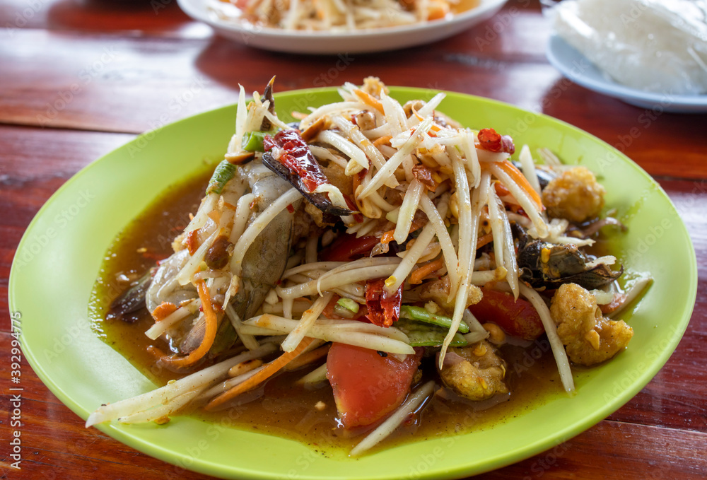 Thai food, green papaya salad with raw shrimps and fermented fish sauce, Som Tam Thai food, green papaya salad with raw shrimps and fermented fish sauce, Som Tam