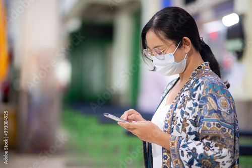 woman using smartphone in the city
