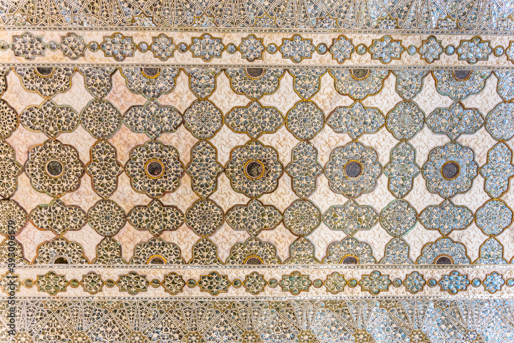 Sheesh Mahal interior covered with thousands of tiny mirrors in Amber Fort, Jaipur, India
