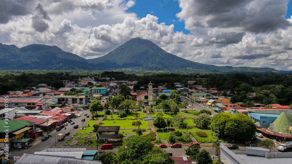 Beautiful aerial view of church in the town of the Fortuna with majestic Arenal Volcano in Costa Rica