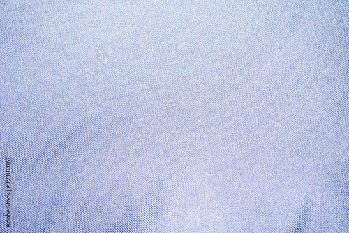 Perspective and closeup view to abstract space of empty natural clean denim texture for the traditional business background in cold bright colors with diagonal shift tilt lines and stitches