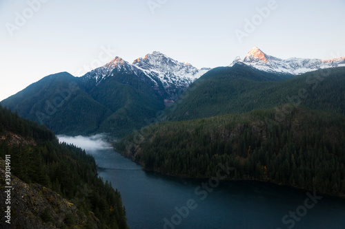 Beautiful landscape view of the sunrise shining on the mountains at Diablo Lake Overlook of North Cascades National Park in Washington state.