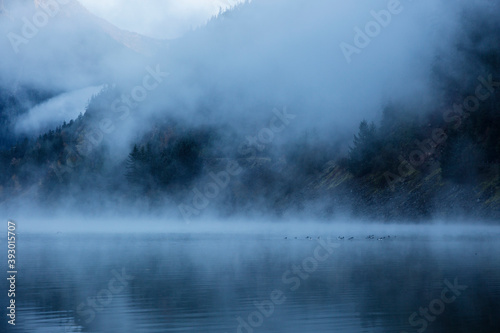A foggy morning landscape in North Cascades National Park in Washington state.