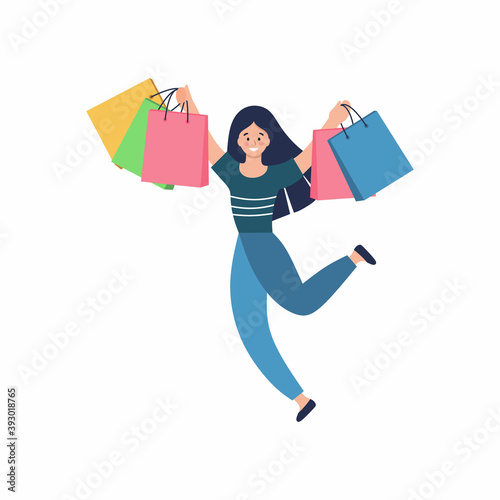 Happy girl with shopping. A woman with bags runs out of the store. Concept of shopping in a supermarket. Online women's clothing store.