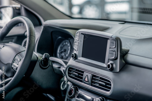 Close-up of car dashboard and steering wheel © zinkevych