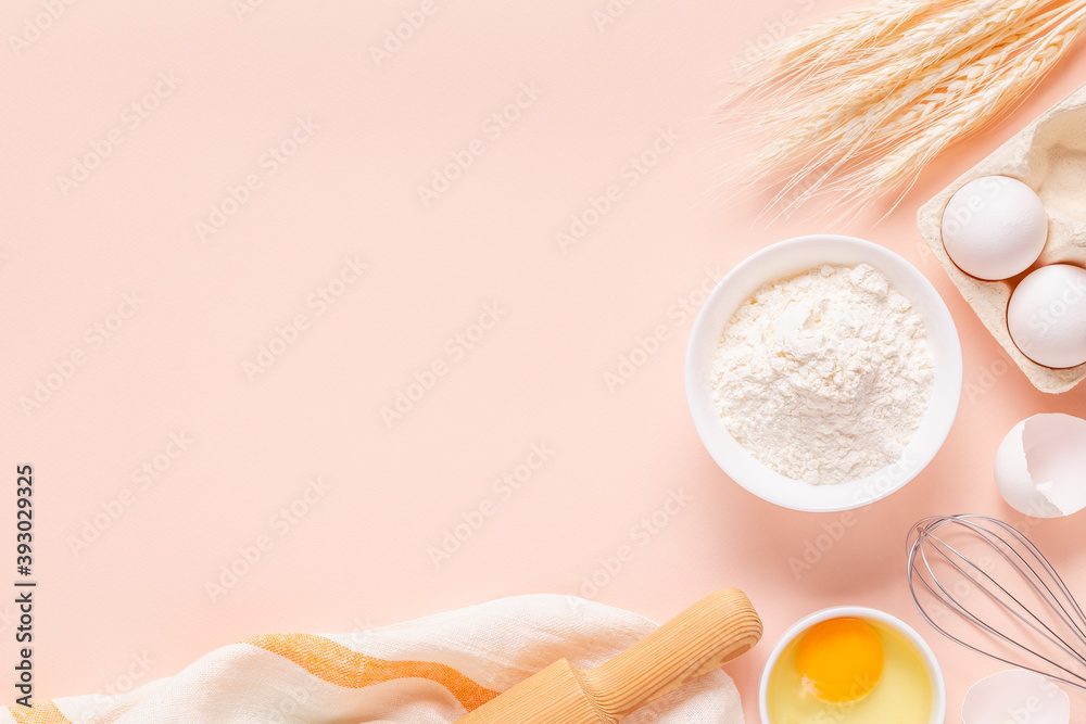 Ingredients for baking on light pink background. Ingredients for baking on light pink background.