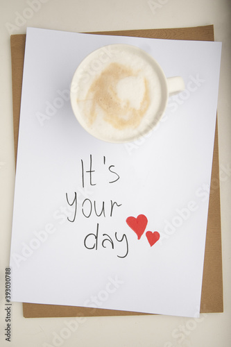 Wishes and care. Motivational lettering and cup of coffee